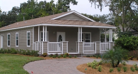 A ranch-style manufactured home with a porch