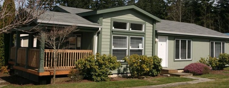 Exterior photo of a manufactured home placed on land