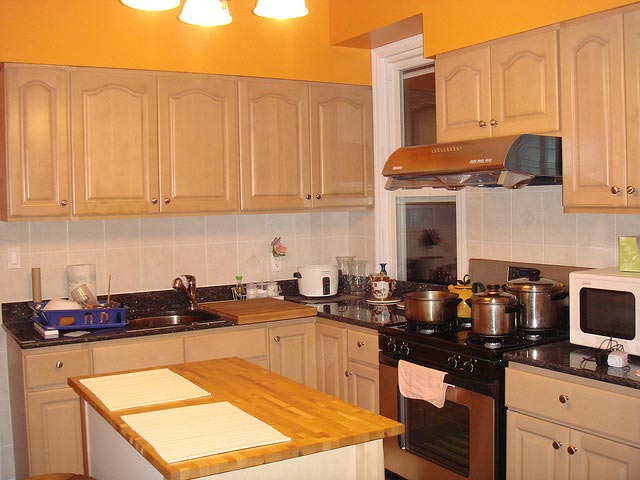 An interior photo of a manufactured home kitchen island